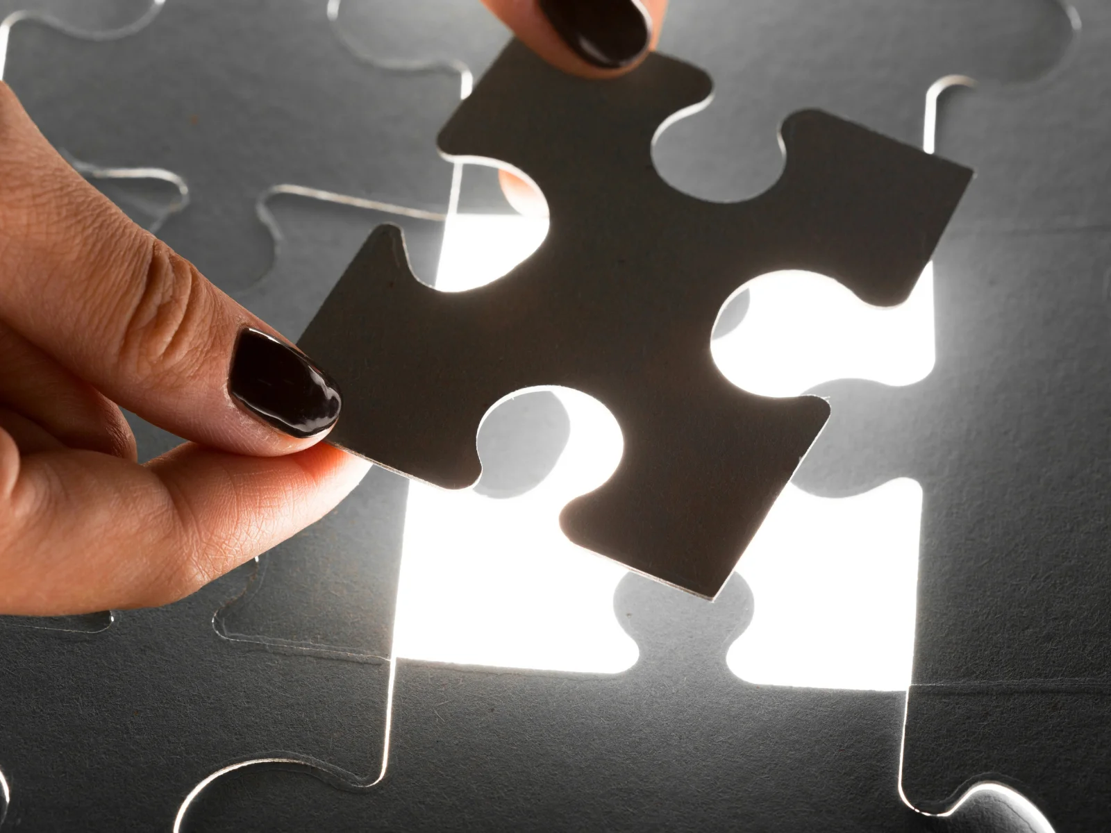 A hand showing globe